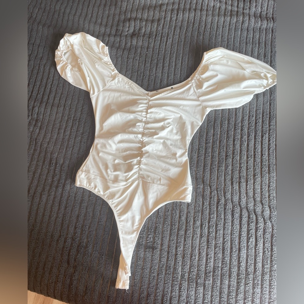 LuLus white body suit